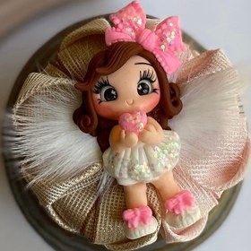 تصویر گلسر عروسکی پر دار 