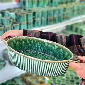 تصویر مرغ خوری سرامیکی وانسل مدل بیضی 