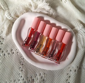 تصویر لیپ اویل طرح گیسو - Purple plum 