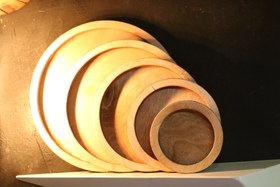 تصویر سینی سرو چوبی ۵ عددی طرح دایره 