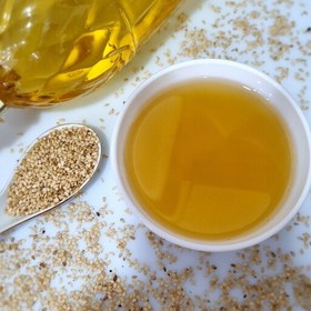 تصویر روغن کنجد اصل یک لیتری بدون افزودنی تهیه شده از کنجد دزفول 