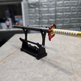 تصویر شمشیر خودکار انیمه شیطان کش رنگوکو 