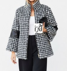 تصویر کت خز زنانه سفید و مشکی با چرم مشکی 