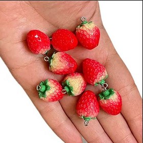 تصویر خرجکار توت فرنگی پلاستیکی 