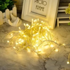 تصویر ریسه سوزنی طلایی LED 