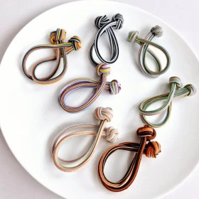 تصویر کش مو گره ای رنگارنگ کد ۳۱۱۲ 