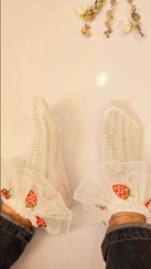 تصویر جوراب ابریشمی توت‌فرنگی‌دار 