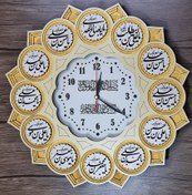 تصویر ساعت دیواری طرح مذهبی مدل لبخند طلایی لبخند طلایی