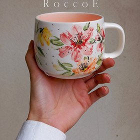 تصویر ماگ سرامیکی دستساز طرح گل نیلوفر Handmade ceramic mug flower design