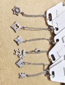 تصویر آویز ساعت - مکعب نگیندار طلایی 