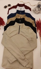 تصویر بلوز نیم زیپ چشمی - سفید / تا ۴۲ / قد ۶۰ 