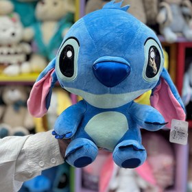 تصویر عروسک استیج نشسته 