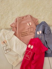 تصویر بولیز آستین پر دار 