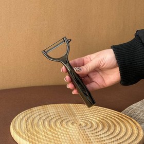 تصویر پوست کن شنگیا مشکی 