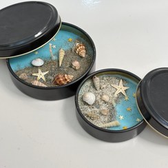 تصویر شمع دریایی در ظرف فلزی 