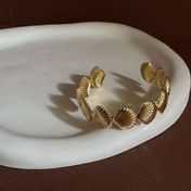 تصویر دستبند زنانه استیل صدف 