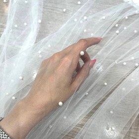 تصویر تور مرواریدی پانچ شده 