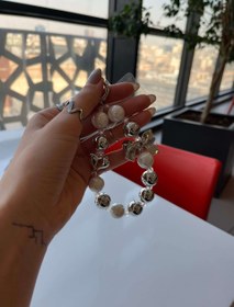 تصویر بند مرواریدی string of pearls 