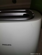 تصویر توستر فیلیپس مدل HD2581 رنگ سفید دارای ترک خیلی ریز طبق تصویر 