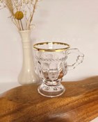 تصویر فنجان پایه دار لب طلایی 