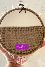 تصویر آویز رو دری ، تلفیق قلاب بافی و گل مصنوعی 