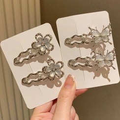 تصویر گیره مو گل و پروانه فانتزی فلزی نقره ای 