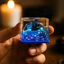 تصویر گوی دکوراتیو مدل کشتی معلق از جنس شیشه شفاف 