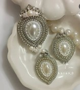 تصویر ست گوشواره و گل سینه مرواریدی Pearl earrings and brooch set