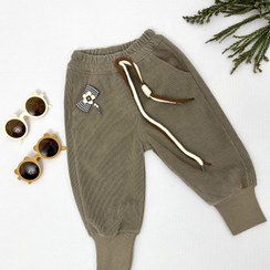 تصویر شلوار بچگانه کبریتی رنگ کرم 