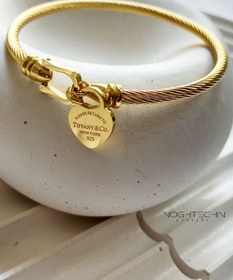 تصویر بنگل زنانه برند تیفانی مدل طنابی استیل رنگ ثابت Tiffany brand women's bangle, steel rope model, fixed color