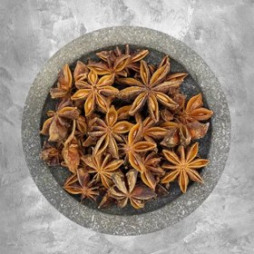 تصویر بادیون ستاره ای(بادیان خَتایی یا انیسون ستاره‌ای یا انیسون بَرّی) Illicium verum