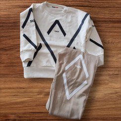 تصویر ست بلوز شلوار بچگانه اسپرت سفید کرم برند مارکو تمام چاپ لوزی سایز 40 Marko brand white cream sports pants blouse set, all rhombus print, size 40