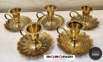 تصویر جا شمعی انگشتی برنجی طرح دار 