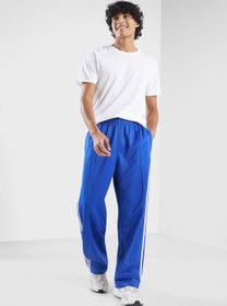 تصویر شلوار ورزشی آدی‌کلر فایر برد برند adidas originals Adicolor Firebird Track Pants