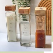 تصویر بطری شیشه ای چهارگوش درب چوبی ظرفیت ۰.۹۵ لیتر 