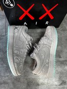 تصویر کتانی نایکی مدل Jordan 1 Kaws مردانه رنگ طوسی 