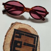 تصویر عینک میو‌میو بیضی ترند - پلنگی-صورتی 