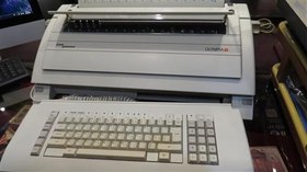 تصویر ماشین تایپ دوزبانه المپیا باگارانتی 