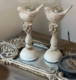 تصویر یک جفت شمعدان گنجشکی 