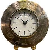 تصویر ساعت رومیزی فلزی طلایی ، با طرح نیم‌کره جغرافیایی 