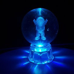 تصویر گوی کریستالی طرح فضانورد 