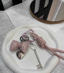 تصویر چارم بگ - صورتی اویز پاپیون و کلید 