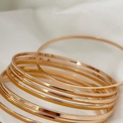 تصویر النگو آینه‌ای استیل برند YSX – رنگ طلایی براق (ست چندتایی) 