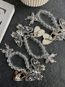 تصویر بند و آویز پروانه فلزی چسبی 