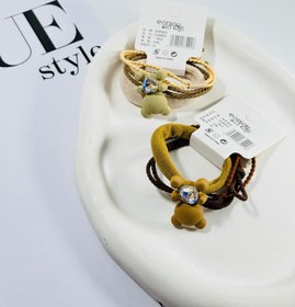 تصویر کش موی خرسی - کرمی 