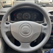 تصویر فرمان چرم دوزی شده پرسی ریو 