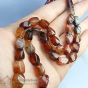 تصویر تسبیح ۳۳ دانه عقیق سلیمانی تراش زاویه دار 