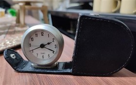 تصویر ساعت جیبی زنگدار کیف چرم 