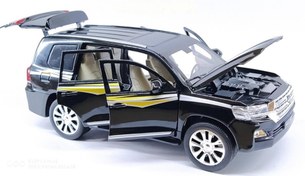 تصویر ماشین اسباب بازی پرادو دودزا مقیاس ۱/۲۴ موزیکال 