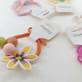 تصویر کش مو بچگانه توپی 